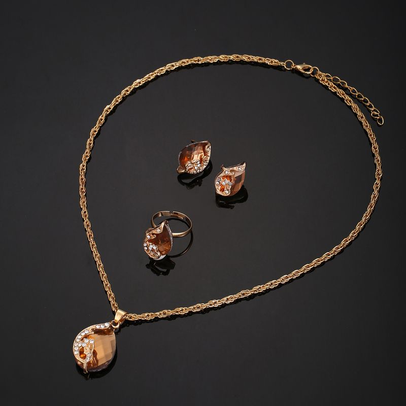 Unisex-tillbehör Diamantfrostat läderkvartsklocka Casual Enkel Unik Peacock-smyckeset_voghion.com