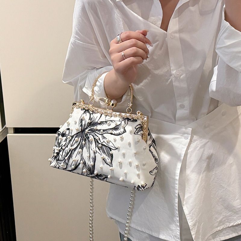 2025 Neue Mode Exquisite Abend Nationalen Stil Künstlerische Crossbody High-end Clip Handheld Shell Tasche_voghion.com
