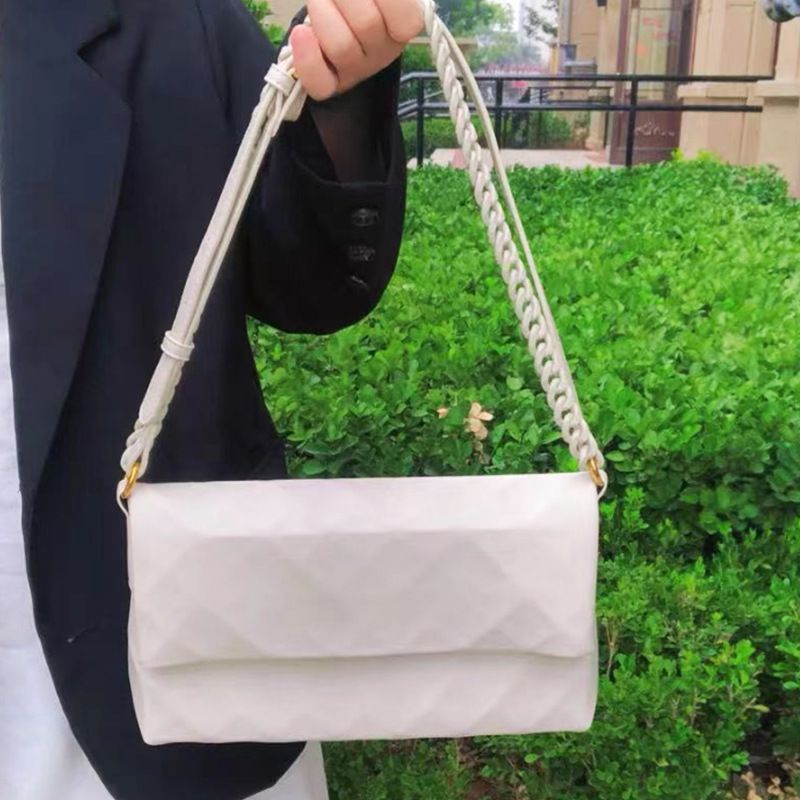 2025 Nova Bolsa Crossbody Feminina Niche Design Fashion Versátil Alça de Corrente Ombro Único Couro Genuíno Axilas de Alta Qualidade_voghion.com