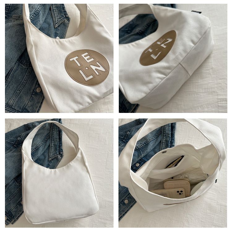 2024 Primavera Nuova Bellissima Borsa Tote in Tela Personalizzata Grande Capacità Moda Donna Borsa a Tracolla Singola per Pendolari_voghion.com
