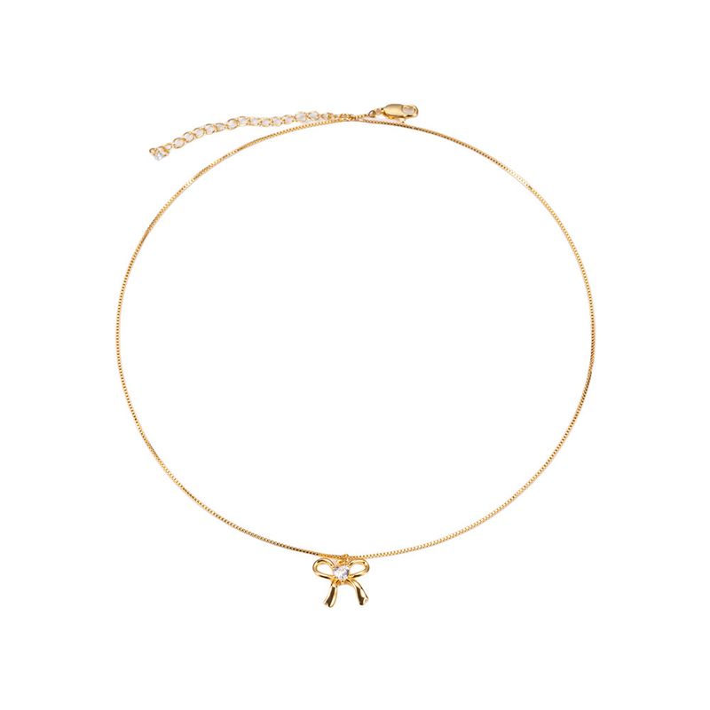 Collana con fiocco alla moda, orecchini con diamanti intarsiati, ciondolo squisito in argento_voghion.com