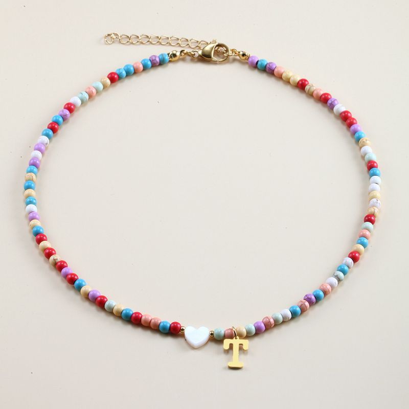 Vendita calda transfrontaliera in acciaio inossidabile oro 26 lettera inglese ciondolo conchiglia amore colore misto turchese collana fai da te clavicola_voghion.com