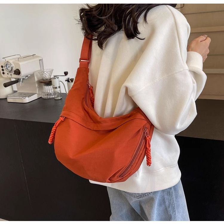 2025 Women's Textured Dumpling-Shaped Multifunctional Crossbody Bag_voghion.com