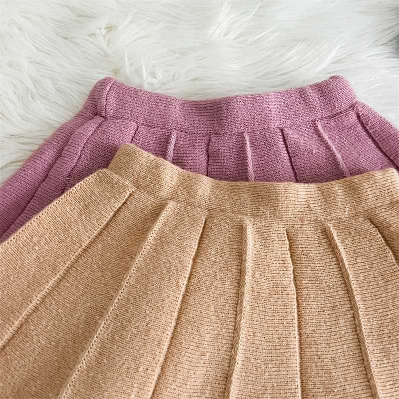 2025 neue Mädchen Gestrickte Pullover Zwei Stück Koreanische Rundhals Einfarbig Bowknot Hohl Einreiher Anzug Rock_voghion.com