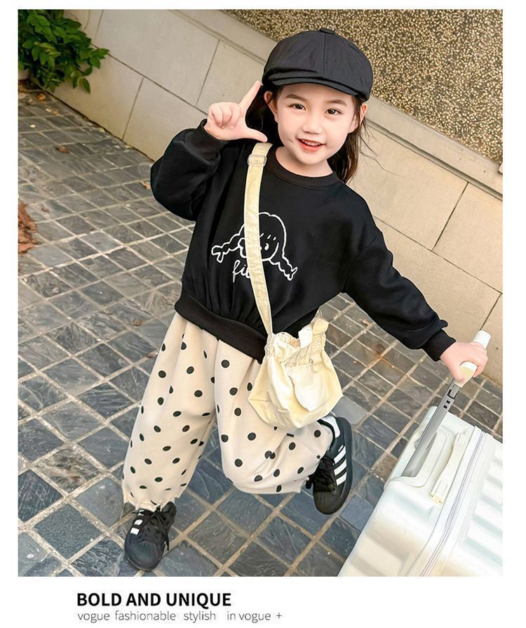 Mädchen Herbstanzug 2025 – Neue koreanische Version für Kinder im ausländischen Stil – Modisches zweiteiliges Set aus schwarzem Pullover und gepunkteter Hose_voghion.com