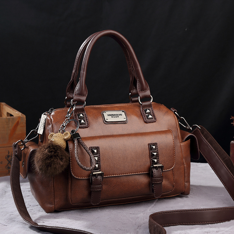 2023 Xiti Paul New Style Crossbody Große Kapazität Handheld Kontrast Kissen Boston Damentasche_voghion.com