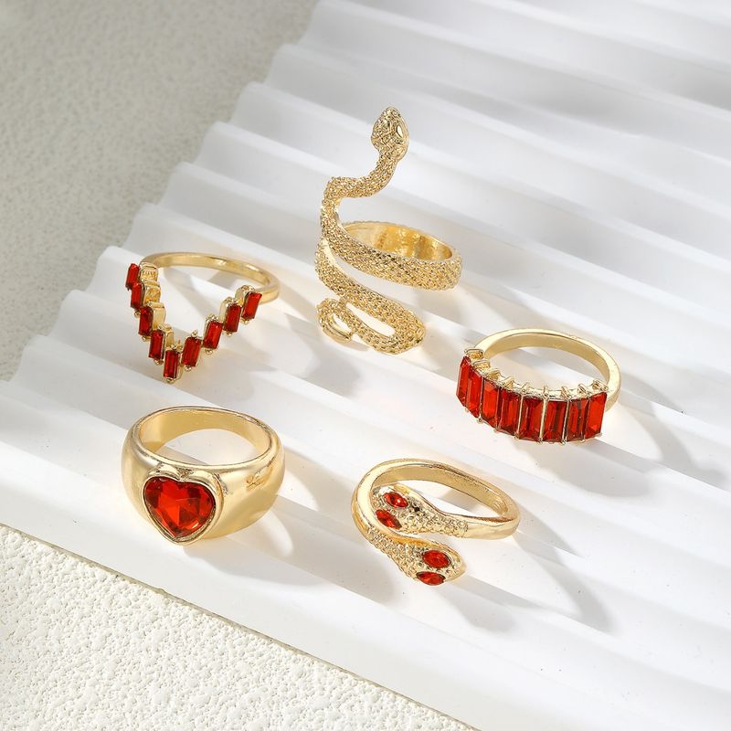 Set di anelli con gemme intarsiate geometriche retrò New Tide Individuality 2024, set di anelli in metallo liquido a quattro pezzi, Paty Jewelry_voghion.com