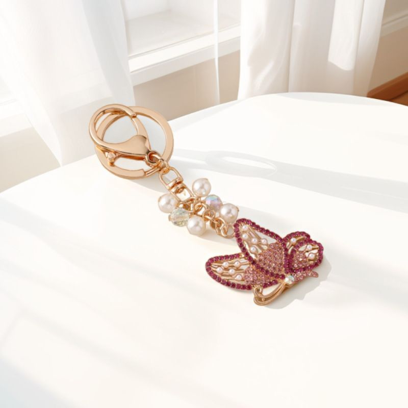 Portachiavi con ciondolo a forma di farfalla in lega di strass, creativo e alla moda coreana, per auto e borsa._voghion.com