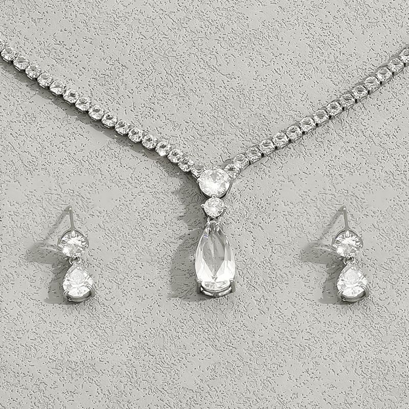 Conjunto de collar y pendientes para mujer, minimalista y fresco, edición coreana, pendientes de gota de agua con incrustaciones de circonita, clavícula versátil_voghion.com