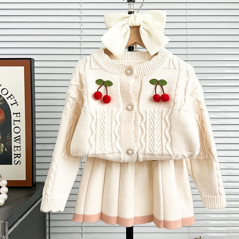 2025 Nuovo stile ragazze maglia gonna abito girocollo due ciliegie monopetto gonna abito stile occidentale alla moda due pezzi_voghion.com