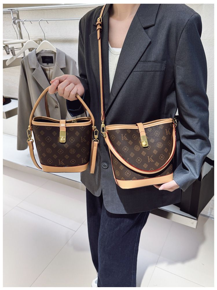 Tendenza di quest'anno: borsa a secchiello leggera e lussuosa stampata per le donne, nuova borsa alla moda 2025, borsa a tracolla versatile_voghion.com
