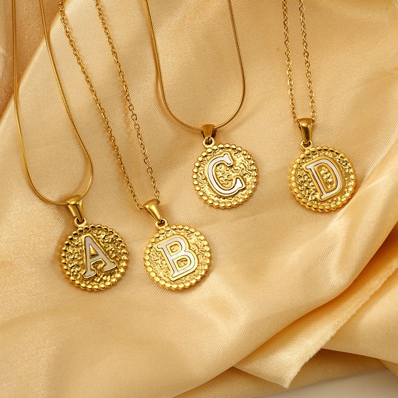 Europese en Amerikaanse roestvrijstalen letterketting vrouwelijke Joker titanium stalen ronde hamer letterhanger sieraden groothandel_voghion.com