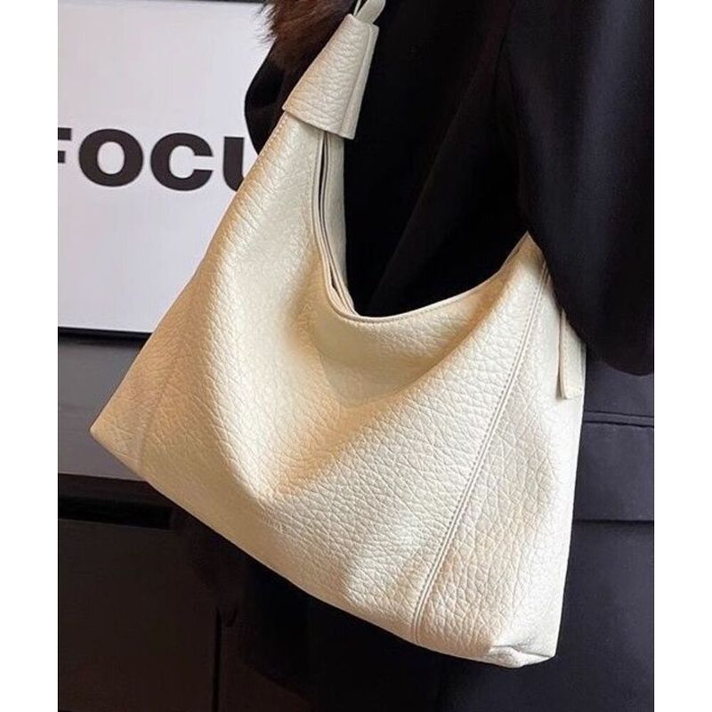 Borsa da donna in pelle di grande capacità 2025 Nuova moda estiva Borsa da pendolare semplice Borsa a tracolla multiuso Versatile Moda squisita_voghion.com