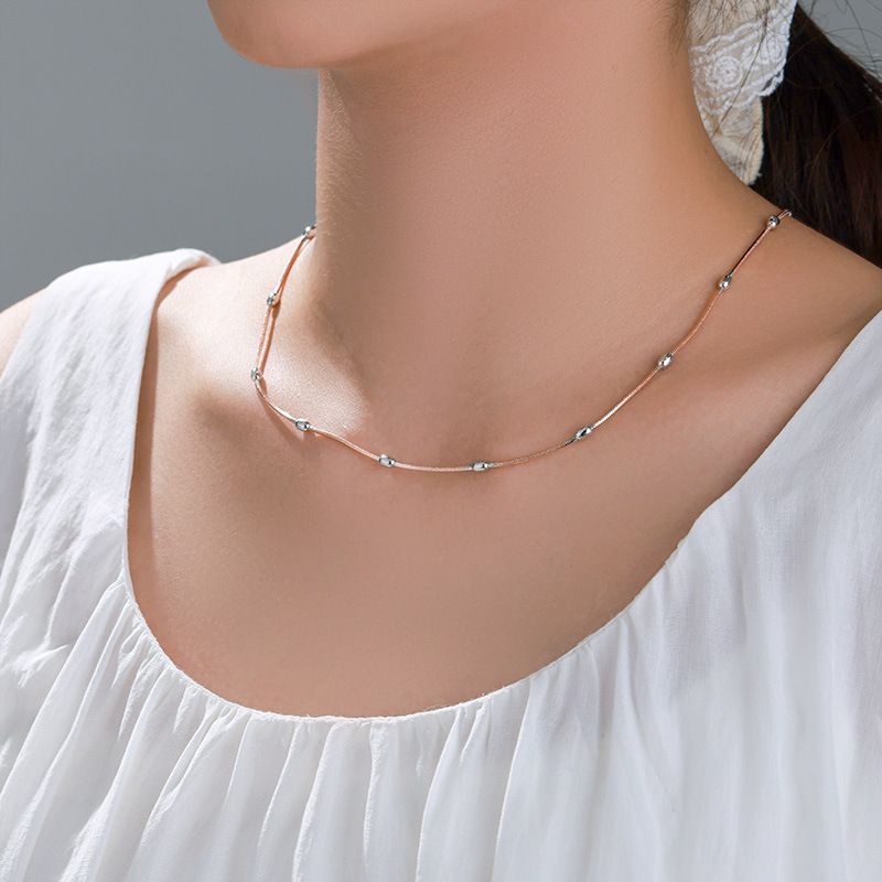 Nuova collana alla moda in stile europeo e americano in oro rosa con design semplice e di nicchia, con catena per clavicola e temperamento quotidiano._voghion.com