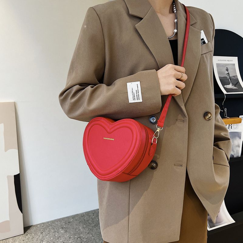 Borsa da donna alla moda a tracolla in solida pelle PU a forma di cuore con croce, conveniente e di alta qualità_voghion.com