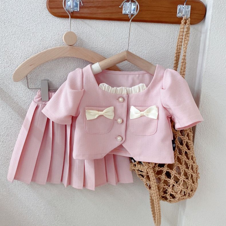 Ropa para niños Ropa para niñas Conjunto de dos piezas con falda plisada y mangas cortas con lazo pequeño_voghion.com