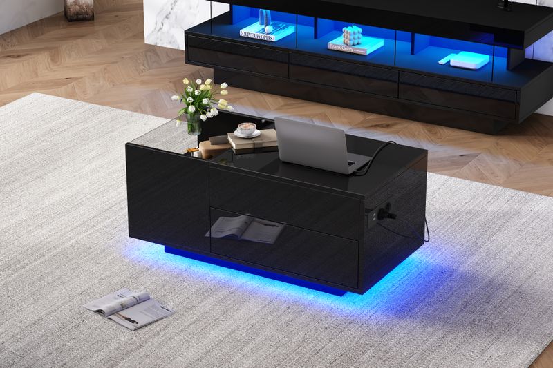 Table basse réglable en hauteur 95 x 48 x 42 cm avec rangement dissimulé, éclairage LED, tiroir et prise de courant - Table d'appoint de salon noire_voghion.com
