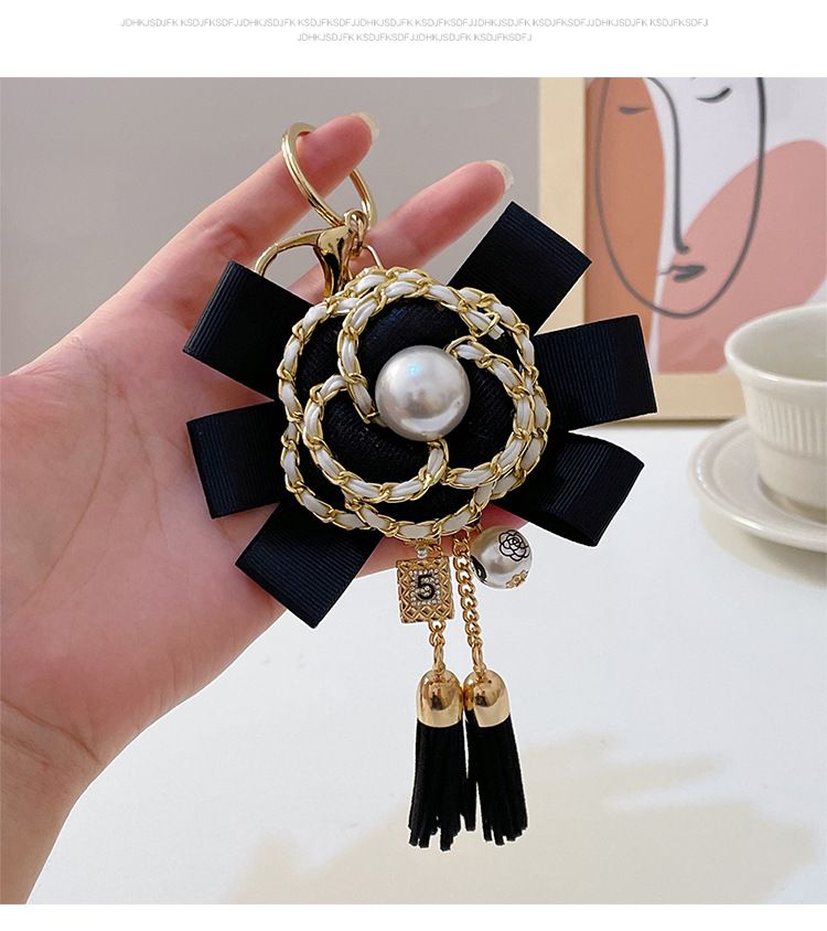 Κορεάτικη μόδα μικρό άρωμα δερμάτινη ταινία καμέλια φούντα μπρελόκ μπουκάλι άρωμα μαργαριτάρι τσάντα κρεμαστό δώρο Πρωτοχρονιάς_voghion.com