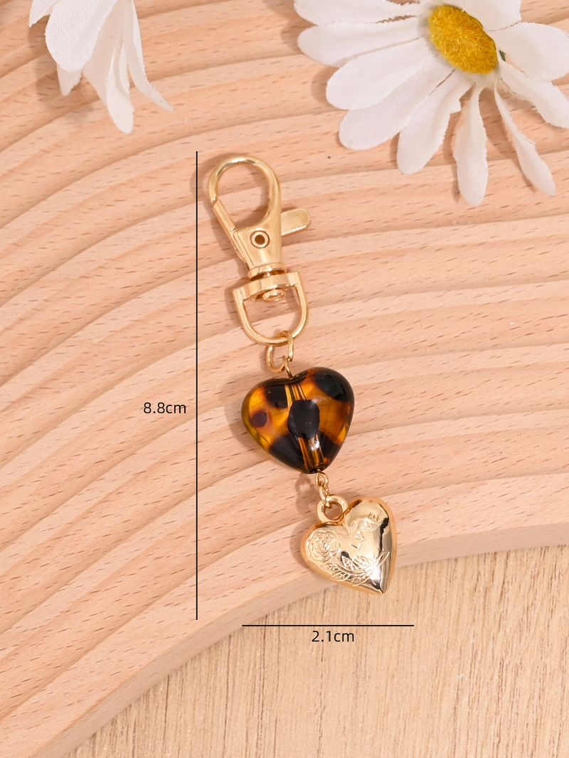 Porte-clés avec pompon et nœud papillon imprimé léopard, nouvelle mode, mignon, pendentif pour sac_voghion.com