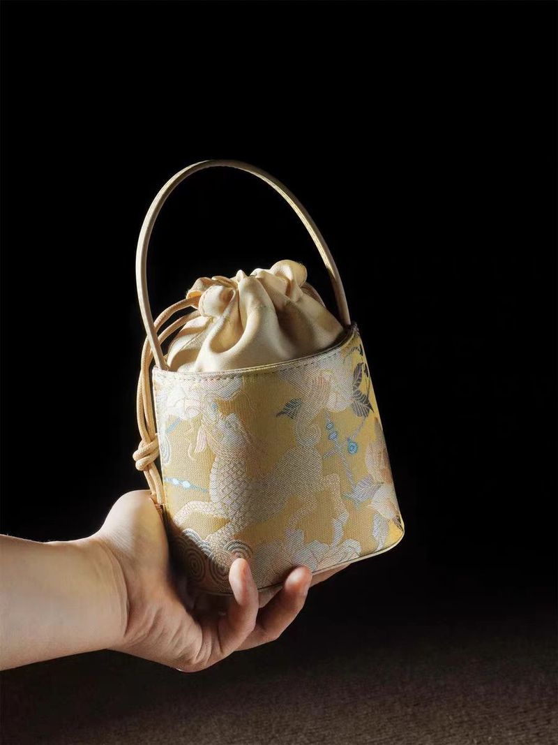 Borsa a secchiello portatile da donna in stile nazionale cinese Kirin Peony, mini 2025_voghion.com