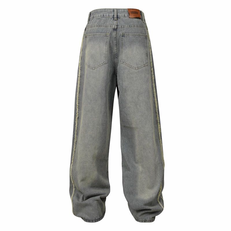 Muška odjeća Modni brend Krojenje Raw Edge Bar Design Isprane stare rupe Izlizane bijele široke nogavice High Street trend muške traperice_voghion.com