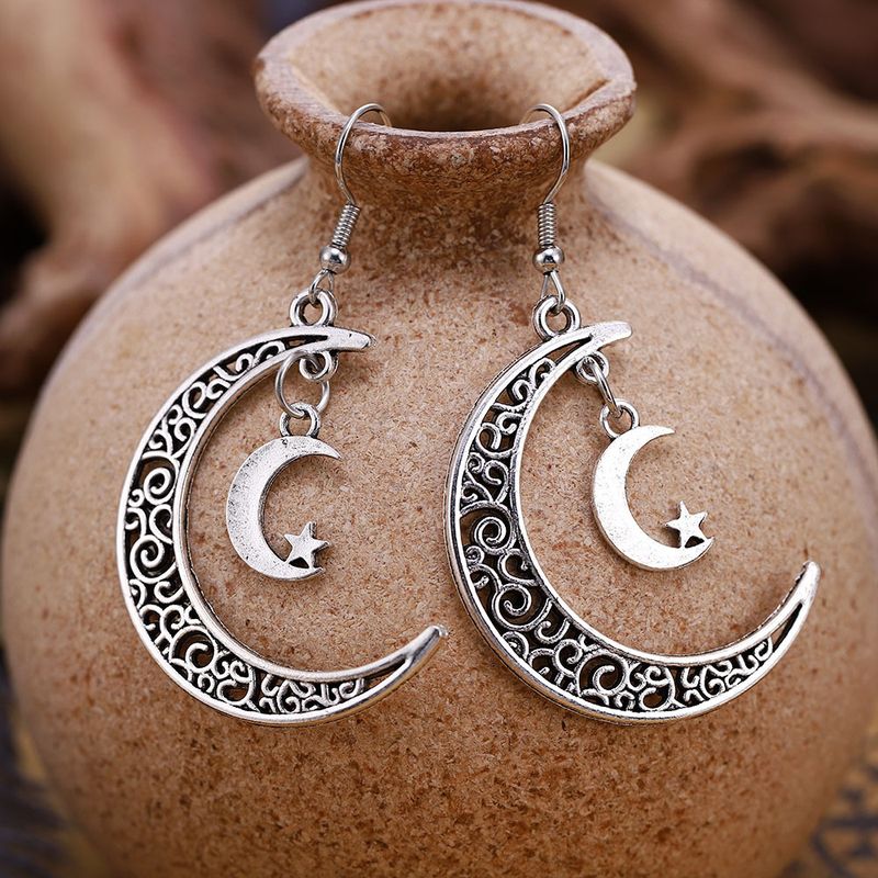 Pendientes de estrella de aleación de luna hueca Pendientes de gancho en forma de media luna_voghion.com