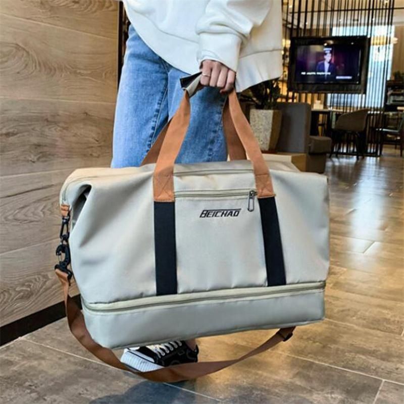 Borsa da viaggio impermeabile e resistente di grande capacità - Borsone in tessuto Oxford con separazione asciutto/bagnato, tracolla fissa in vari colori - Ideale per lo sport_voghion.com