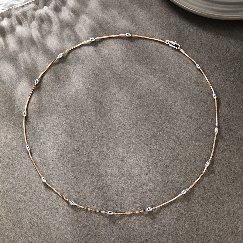 Nuova collana alla moda in stile europeo e americano in oro rosa con design semplice e di nicchia, con catena per clavicola e temperamento quotidiano._voghion.com