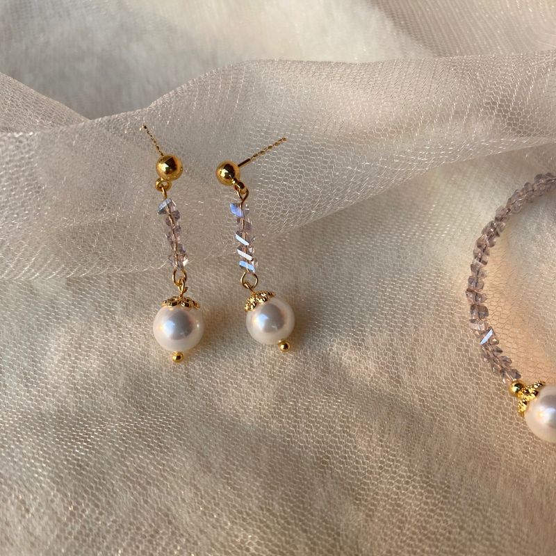 Collana irregolare di ametista grigia Bracciale di perle di conchiglia Orecchini semplificati in edizione coreana Set di gioielli in tre pezzi_voghion.com