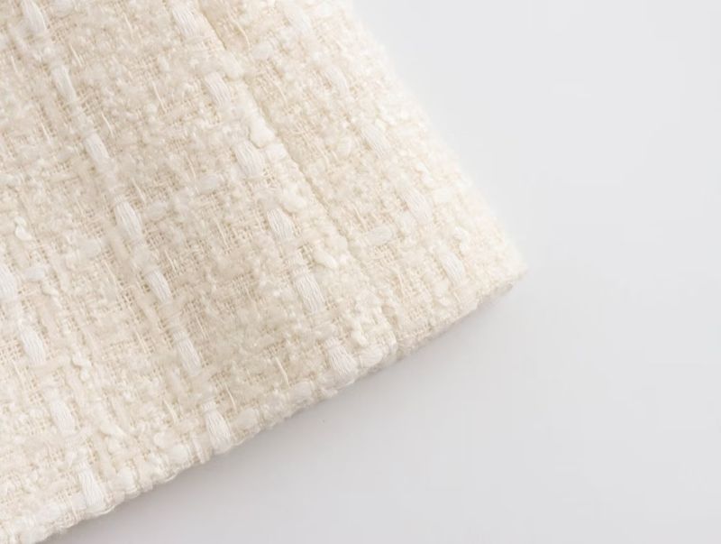 Damjacka med lös kostym med textur och mode_voghion.com