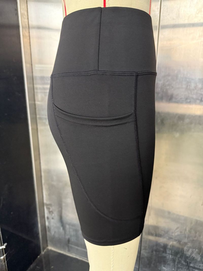 Pantaloncini da yoga sportivi da donna con vita alta e tasca laterale per telefono_voghion.com