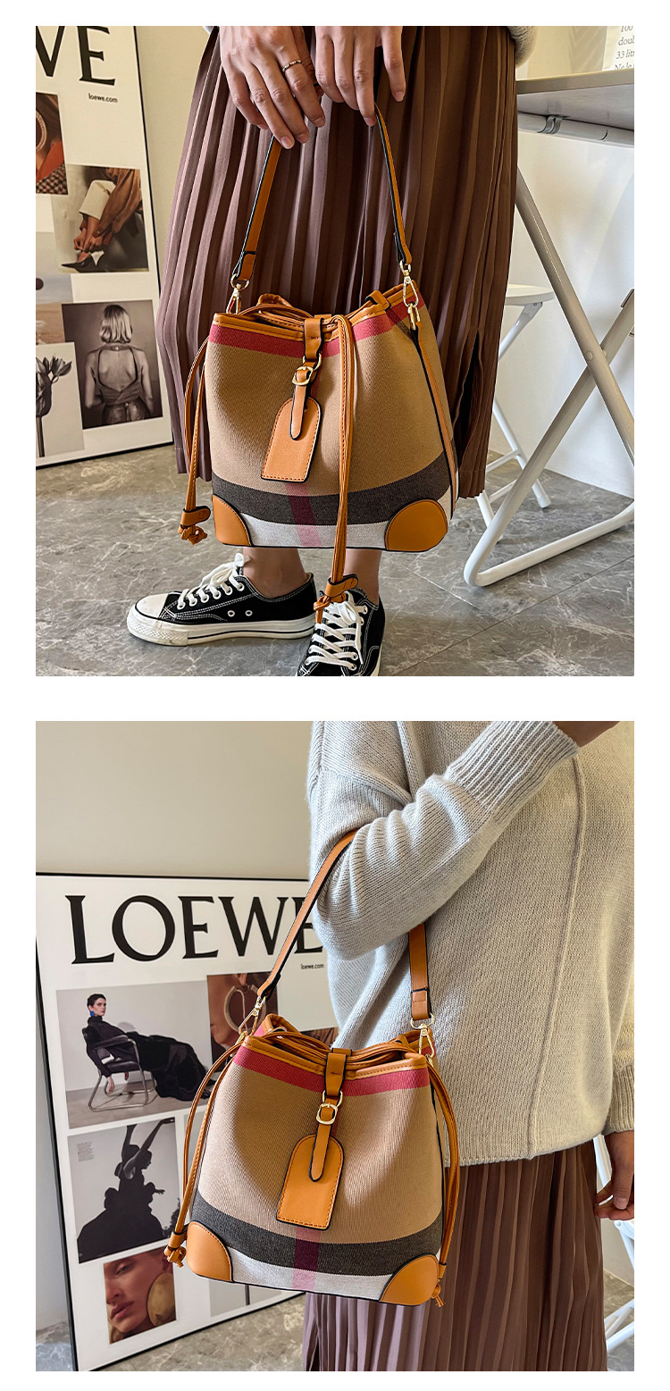 2023 Nieuwe high-end netto rode canvas geruite emmertas Damestas Buitenlandse stijl Messenger bag met enkele schouder_voghion.com