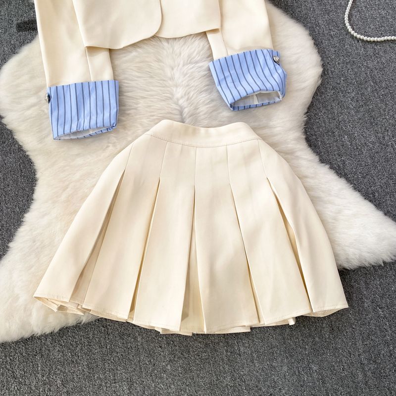 Damenbekleidung Modischer Anzug für Damen, damenhaftes Temperament, gestreifte Anzugjacke mit Spleiß, zweiteiliger Anzug, A-Linien-Rock mit hoher Taille_voghion.com