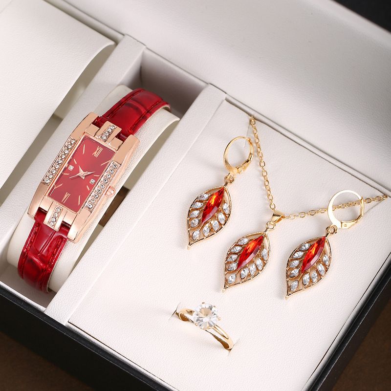 Orologio al quarzo da donna con cinturino in pelle e versatile set di gioielli a forma di foglia - Design minimalista ed elegante con cinturino regolabile_voghion.com
