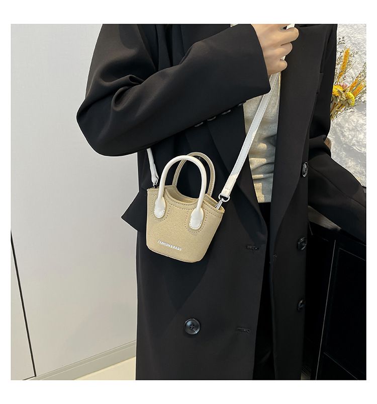 Borsa a secchiello da donna, alla moda, con tracolla monospalla, stile Candy Lover, con rossetto, da portare a spalla, rossa_voghion.com