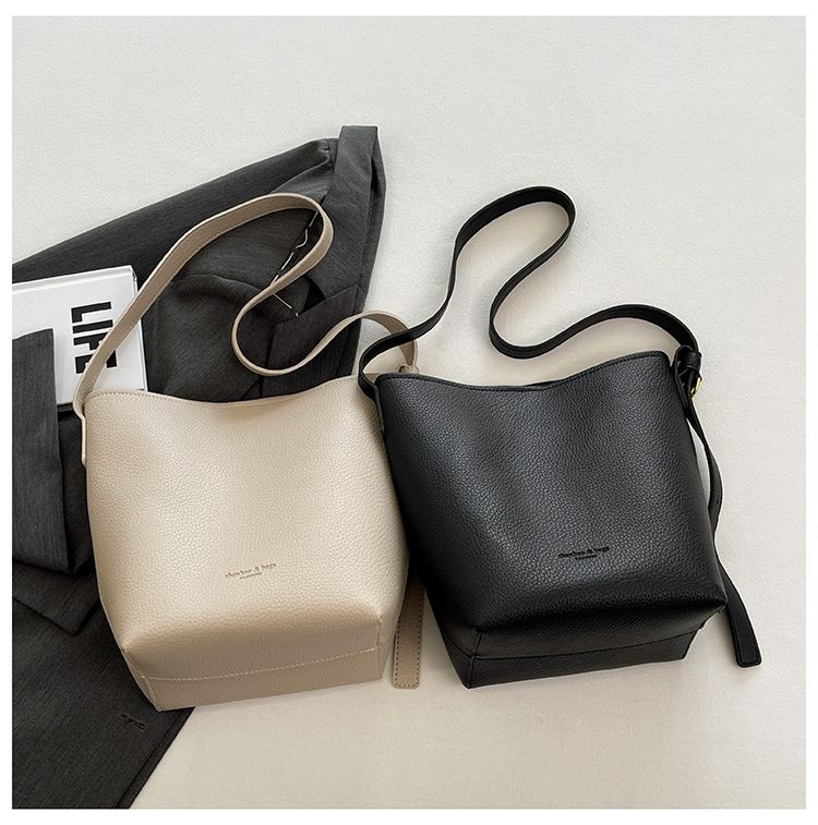 La borsa a tracolla con design a croce diagonale di fascia alta di quest'anno, modello Bucket 2024, è il nuovo stile di moda per mamma e bambino_voghion.com