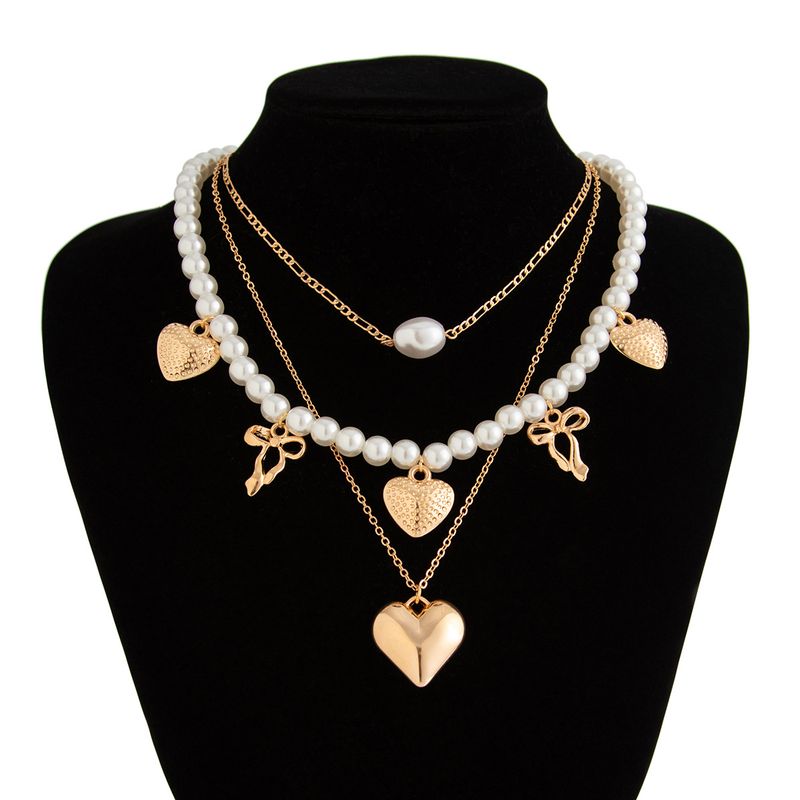 Collana da donna Collana dorata Collana con ciondolo Collana con ciondolo in lega di perle barocche dorate Choker con perline a forma di cuore Set di collane_voghion.com