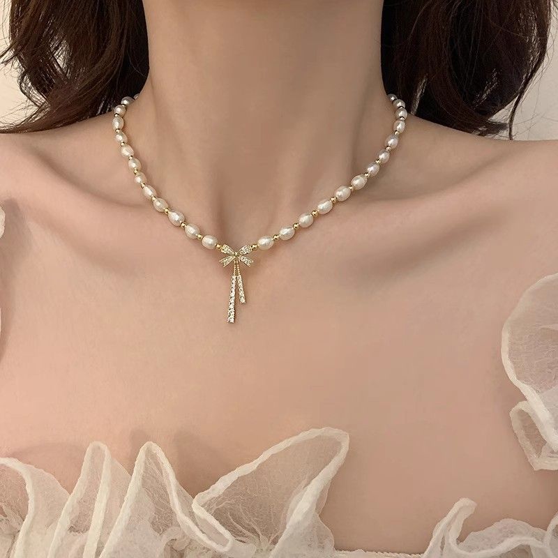 Collar de perlas con lazo para mujer, nuevo diseño moderno, ligero y lujoso, gargantilla de cadena de clavícula con temperamento de celebridad de Internet de alta gama_voghion.com