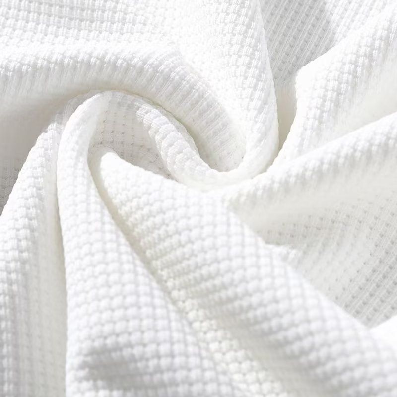 Pantaloncini a maniche corte da uomo all'ingrosso, larghi, finti due pezzi, a pois_voghion.com