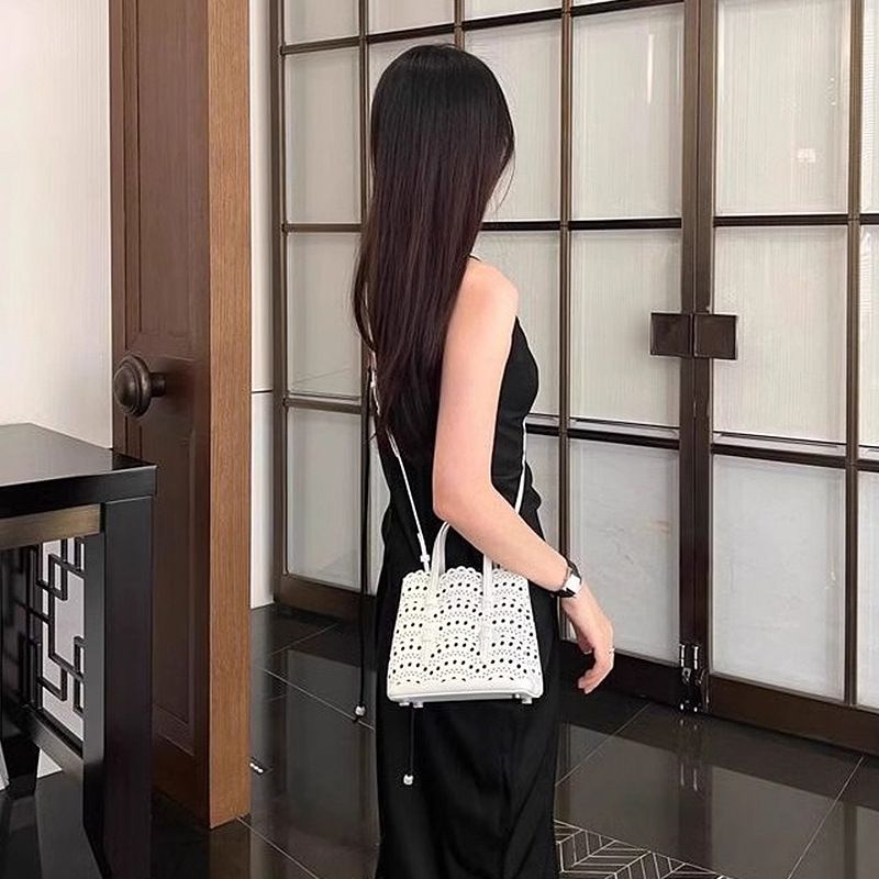 Hand-Rubbed Cowhide Handbag Summer New Laser Hollow Niche Design Crossbody Genuine Leather Women's Bag_voghion.com
