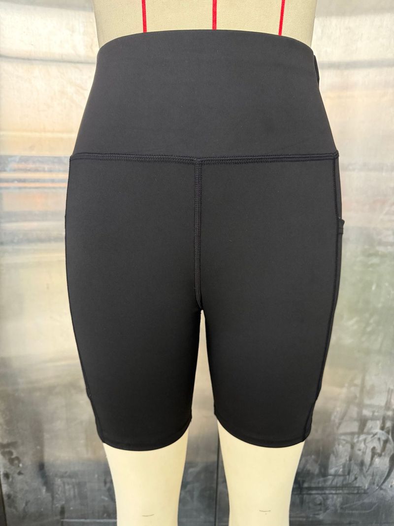 Pantaloncini da yoga sportivi da donna con vita alta e tasca laterale per telefono_voghion.com