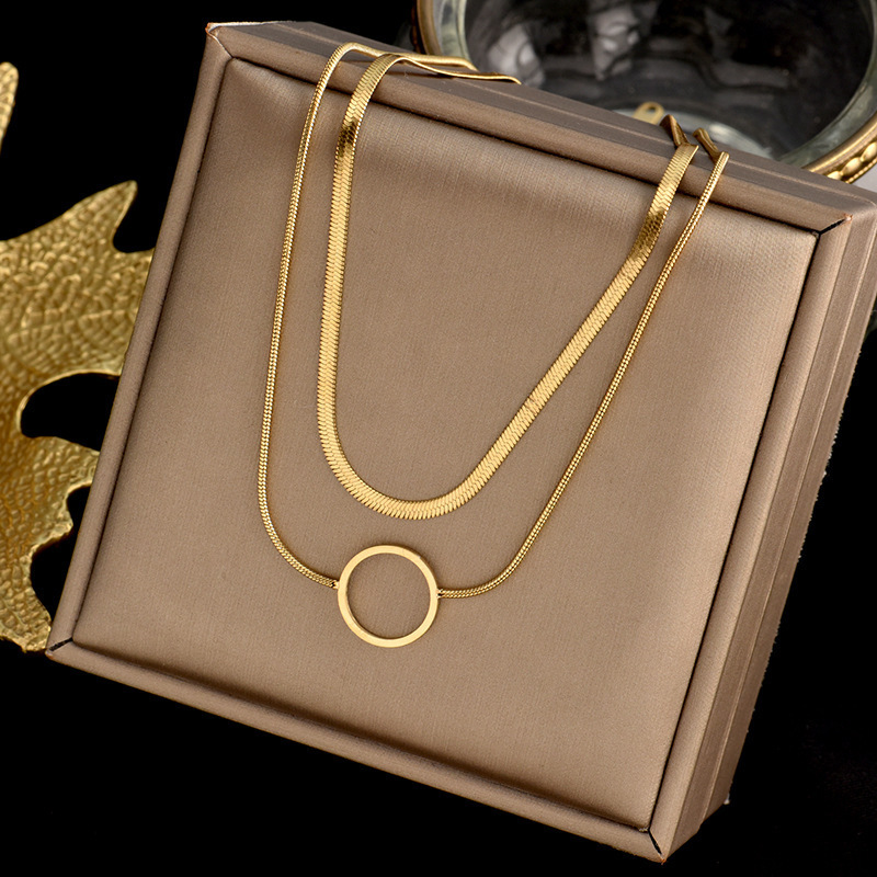 European and American cross-border fashion niche creative high-end double-layer snake chain hollow titanium steel circle pendant accessories necklace_voghion.com