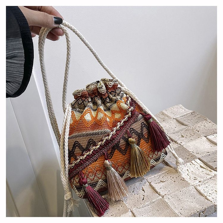 Borsa a secchiello da donna, stile etnico, borsa a tracolla con coulisse e nappa, borsa a secchiello da donna_voghion.com