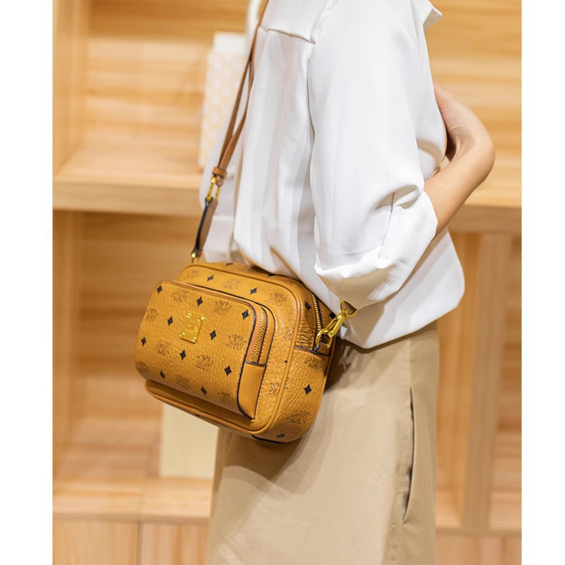 Hong Kong counter genuine leather camera for women's new 2023 high-end texture niche summer wide shoulder strap_voghion.com