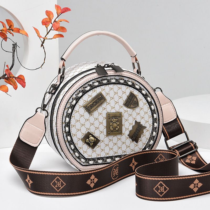 Borse alla moda per le donne di quest'anno 2023, nuova borsa a tracolla con stampa di badge, piccola borsa rotonda con texture alla moda_voghion.com