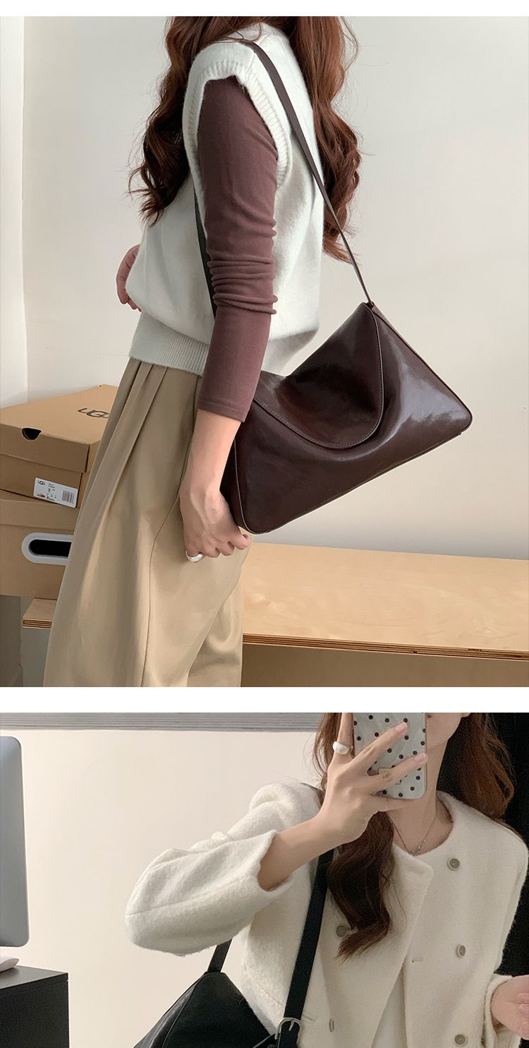 Soft vegetable tanned cowhide tote 2024 new flip shoulder women's crossbody genuine leather armpit bag_voghion.com