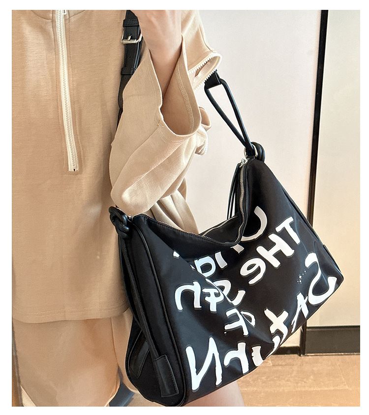 Women's Waterproof Nylon Handbag, 2025 Spring And Summer New Wave Graffiti Leisure Large-capacity Shoulder Bag_voghion.com