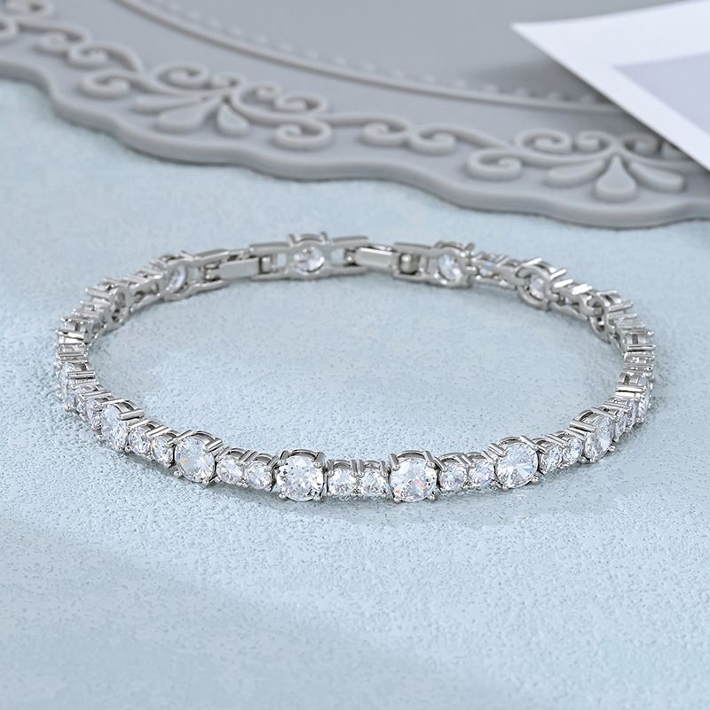 Bracciale da tennis in stile Ins per ragazze con catena in cristallo e diamanti intarsiati, placcato in oro e zirconi colorati._voghion.com