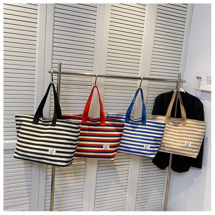 2024 New Spring/summer Popular Simple Shoulder Bag Commuter Handheld Canvas Tote Bag Casual Large Capacity Bag for Women_voghion.com