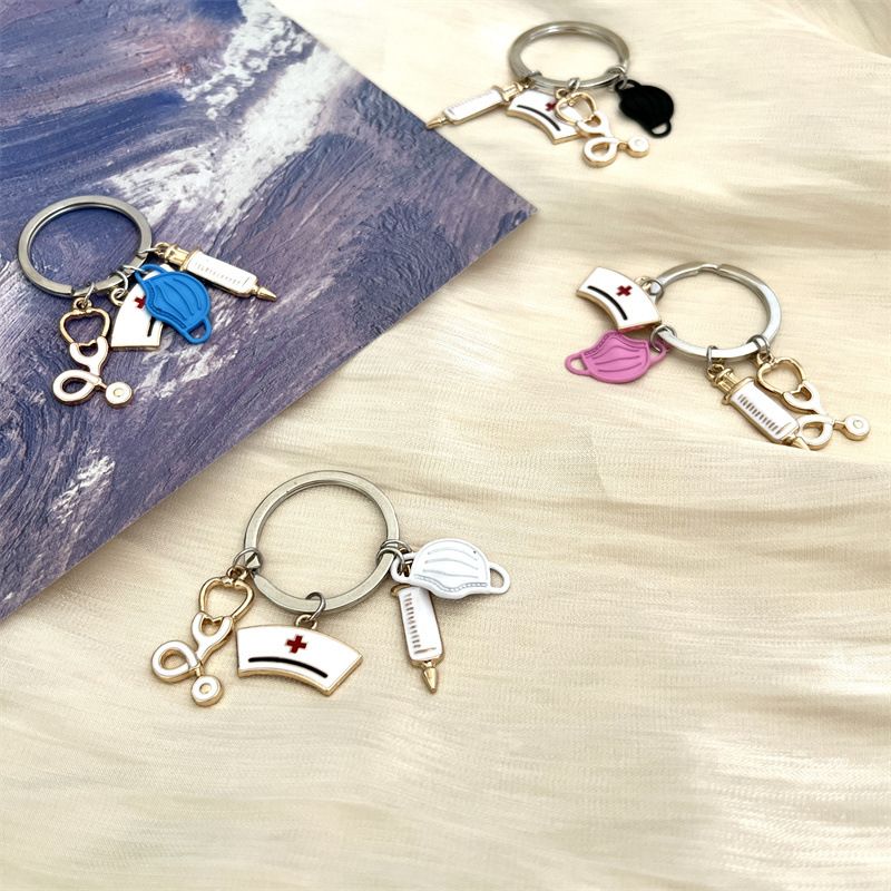 Llavero con colgante de máscara y gorro de enfermera, sencillo y a la moda, personalizado, creativo, estetoscopio, joyería de aleación_voghion.com